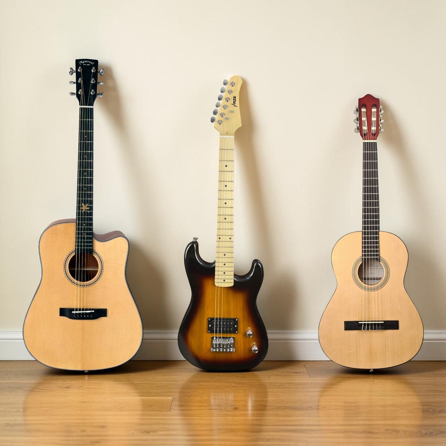 three guitars standing up in a line against a cream coloured wall