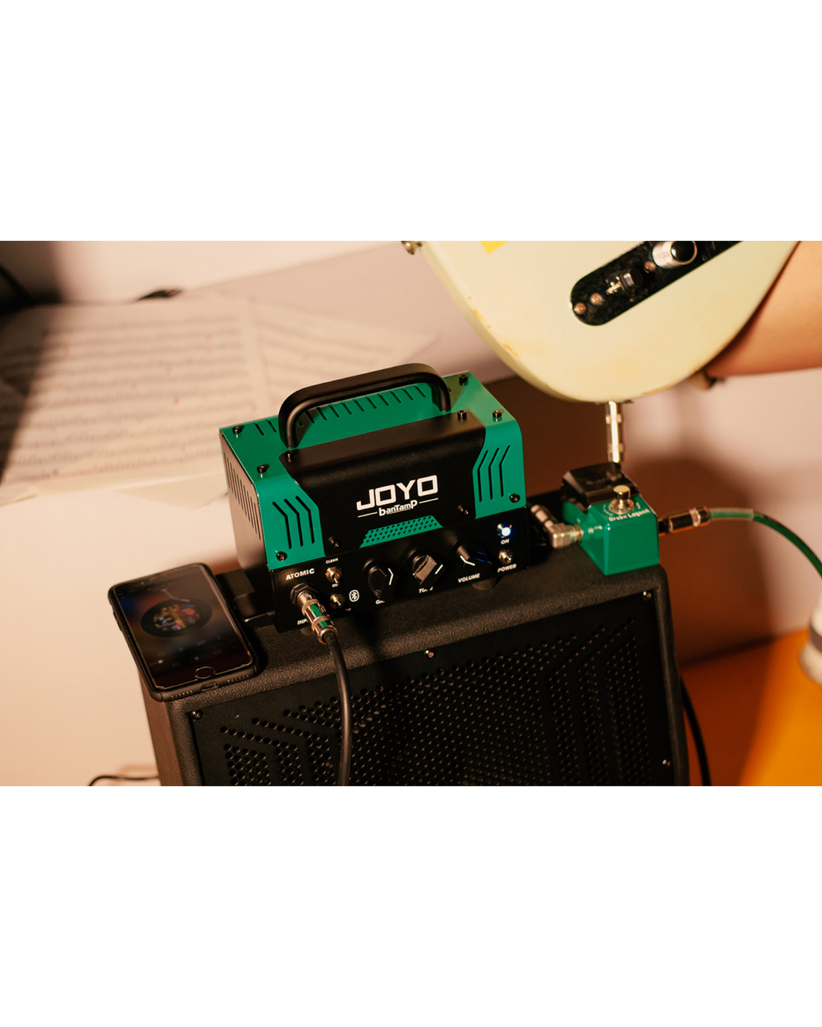 Haze Guitar Australia Joyo BantCab speaker cabinet with a green banTamP amplifier head and electric guitar