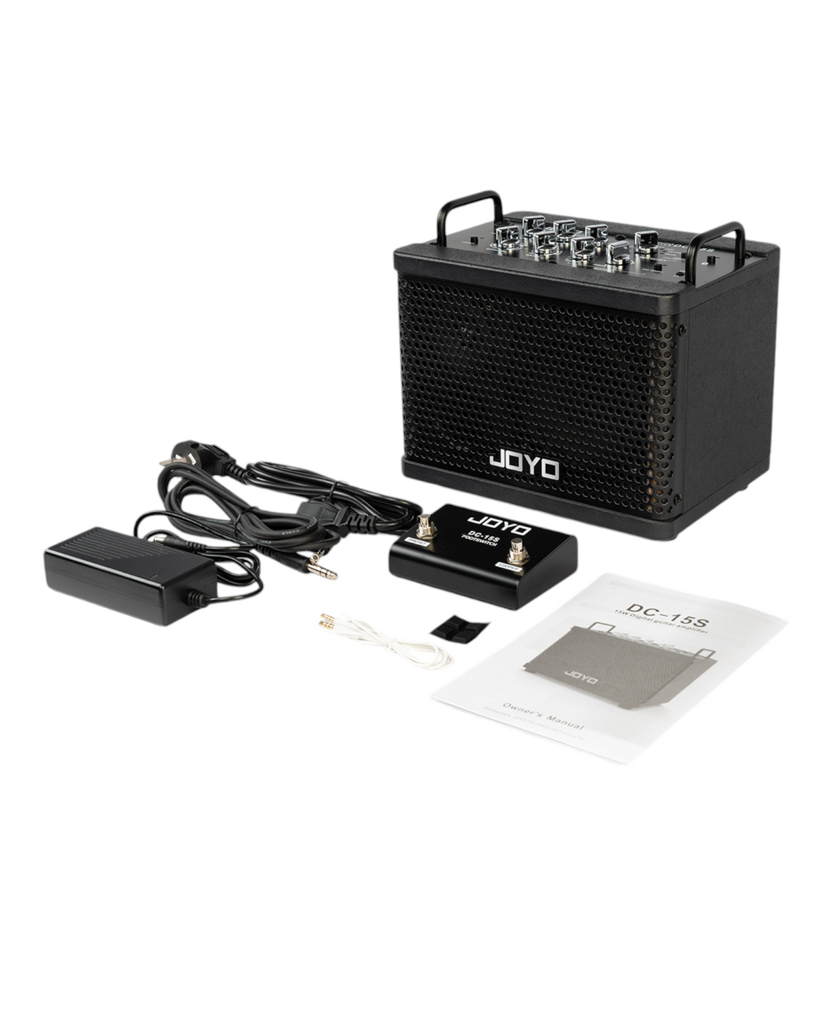 Haze Guitar Australia Joyo DC15S portable 15W guitar amplifier with footswitch, power adapter, and manual.