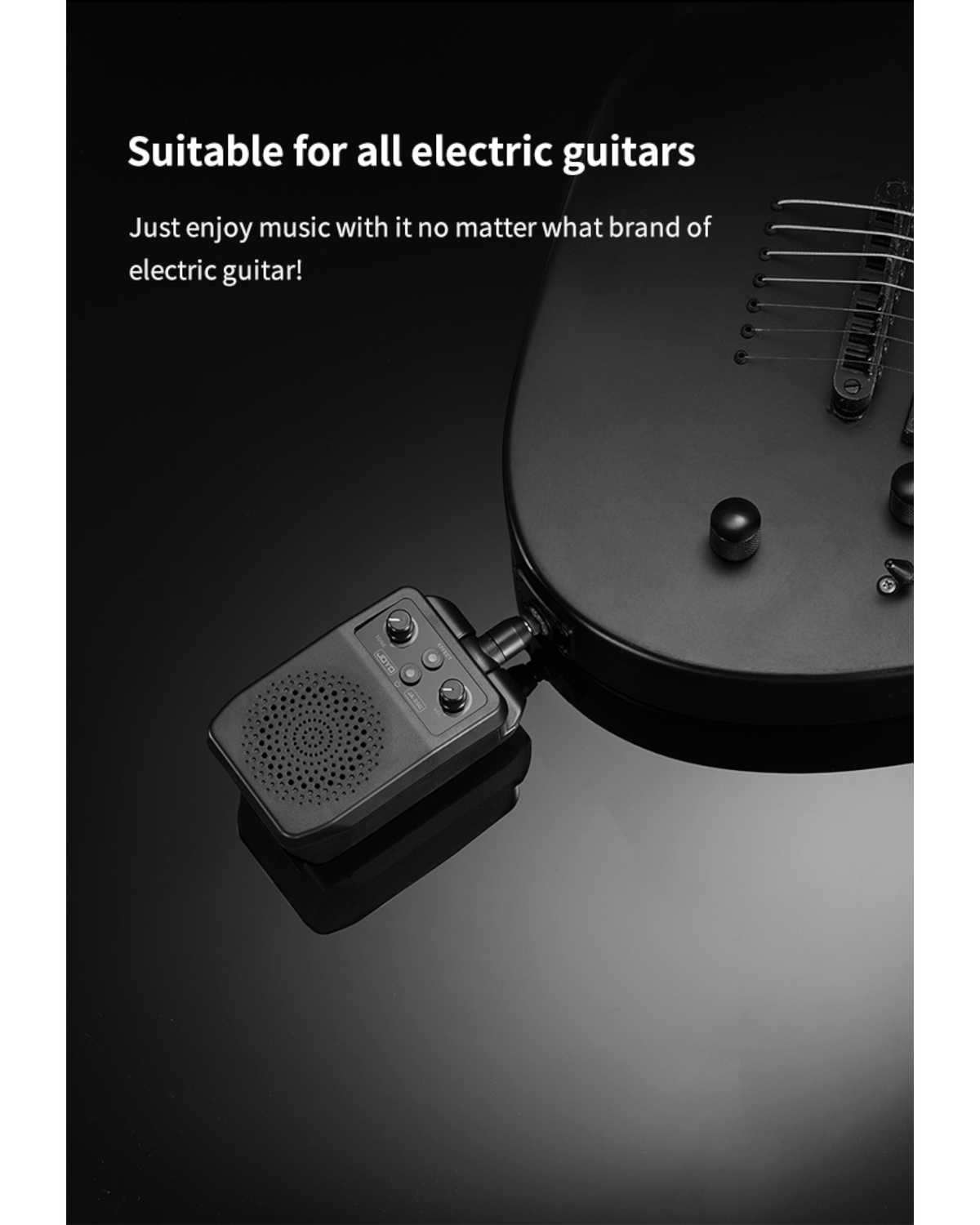 Haze Guitar Australia Joyo JA05G portable mini electric guitar amplifier plugged into a black electric guitar