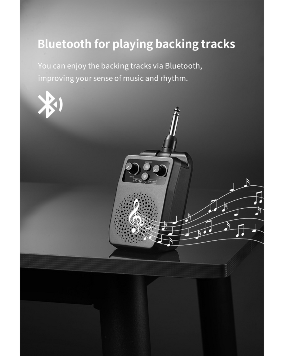 Haze Guitar Australia Joyo JA05G portable electric guitar mini amp with Bluetooth and tone controls on a table